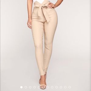 Bow tie khaki pants. Skinny leg.